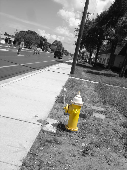 white and yellow hydrant